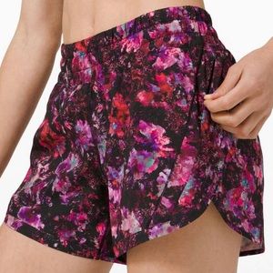 LULULEMON sz 6 Track That Short 5" in
Fluoro Floral Multi (excellent preowned)